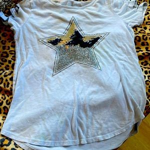 I’m selling a kids 14/16 blue star shimmer shirt from justice